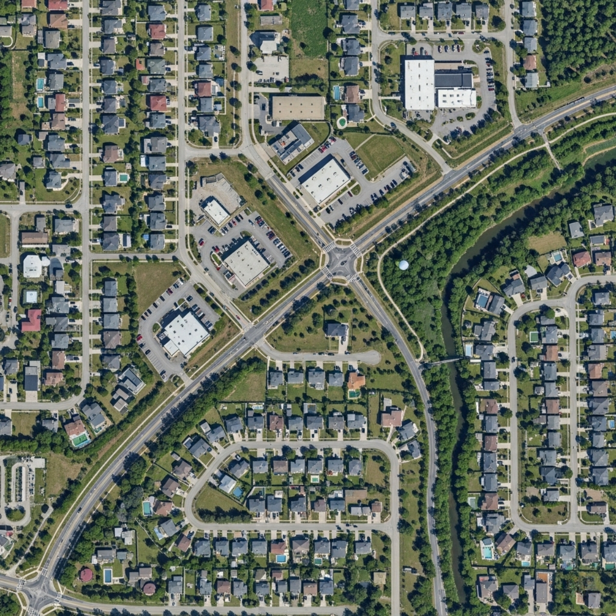 An aerial view of a South Dumdum neighborhood, showing roads, houses, and green spaces, ideal for image annotation services.<br />
