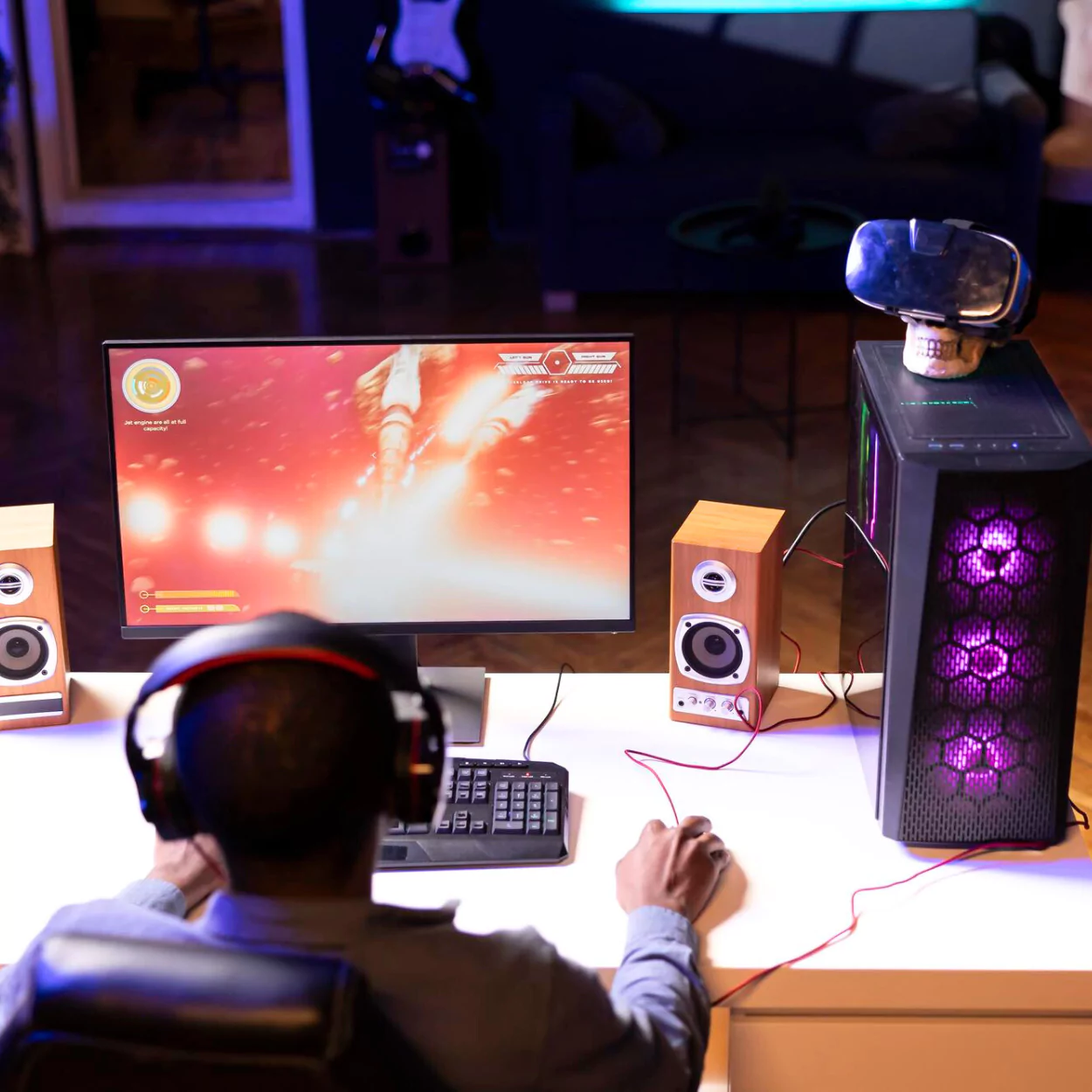 Gamer setup showcasing PC screen and tech, highlighting Content Moderation for Ads Campaigns and Apps